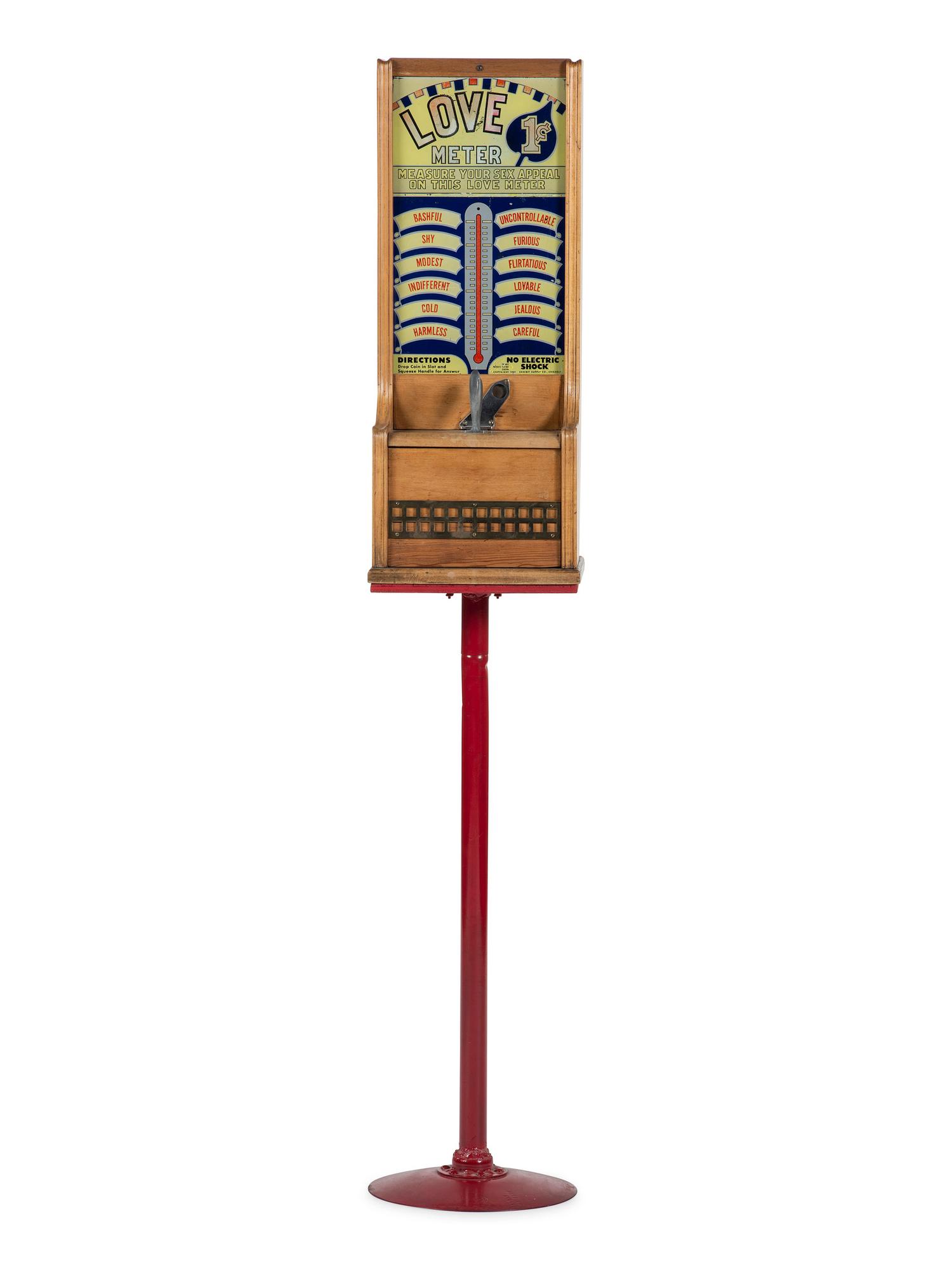 An Exhibit Supply Co. 1 Cent Love Meter on Stand