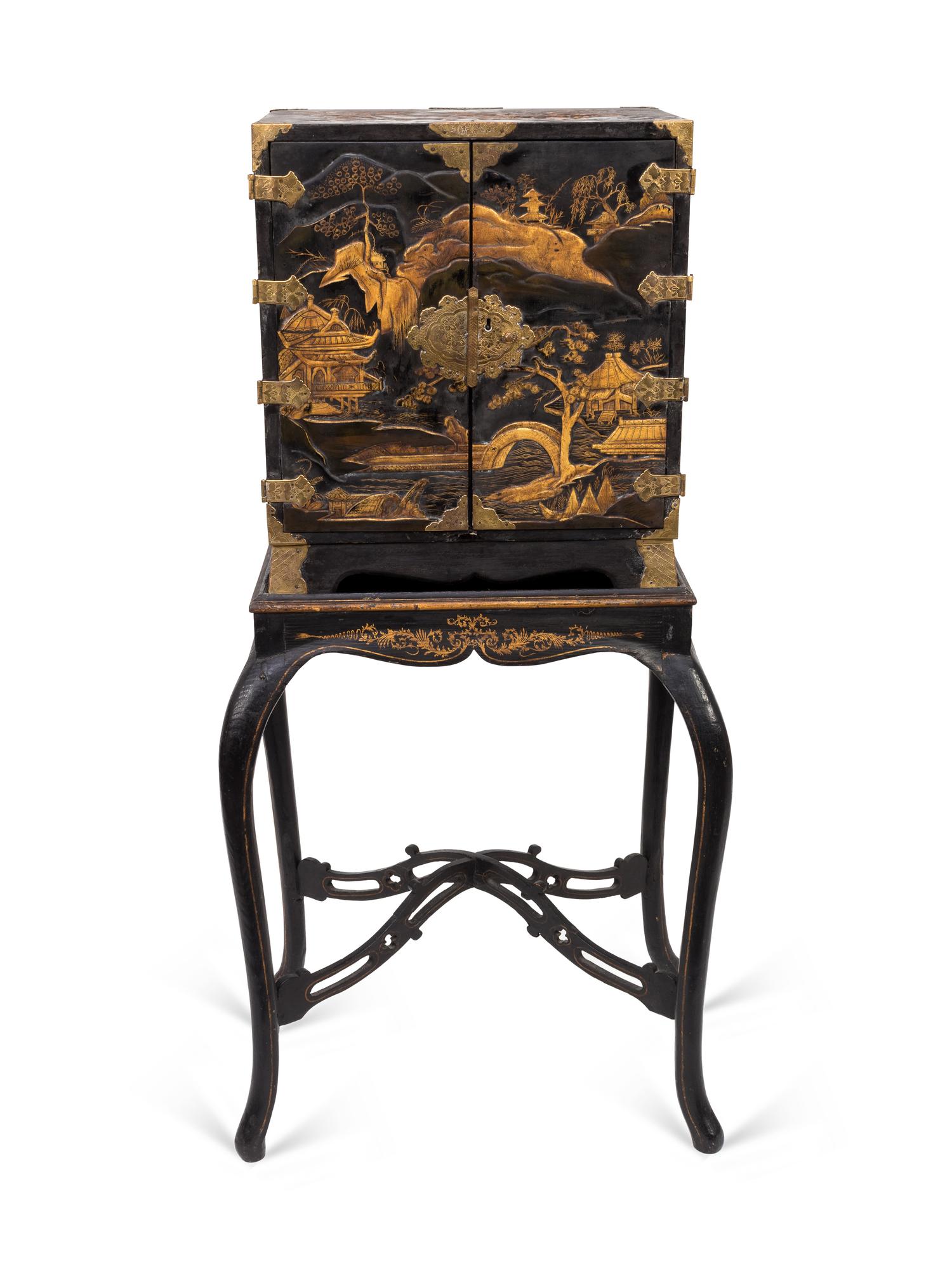 A Japanese Export Gilt Metal Mounted Black and Gilt Lacquer Cabinet on Later Stand — 19TH CENTURY