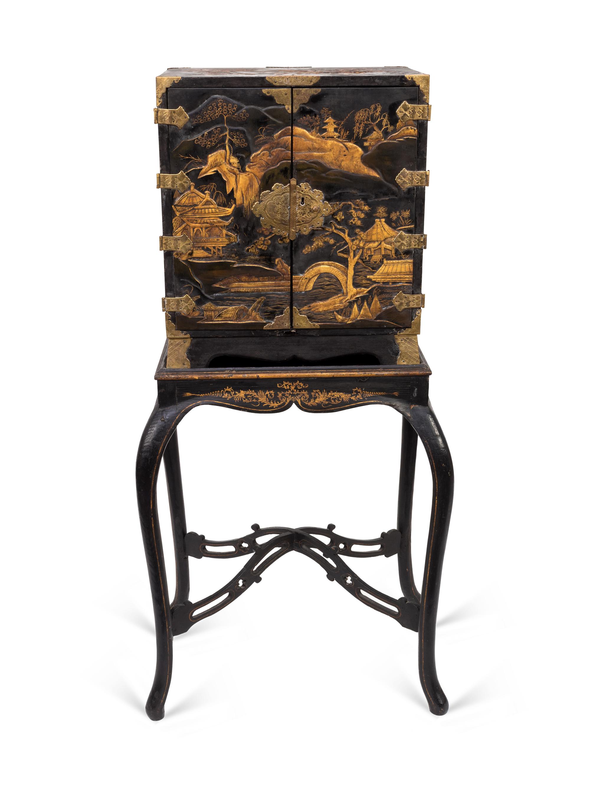 A Japanese Export Gilt Metal Mounted Black and Gilt Lacquer Cabinet on Later Stand — 19TH CENTURY