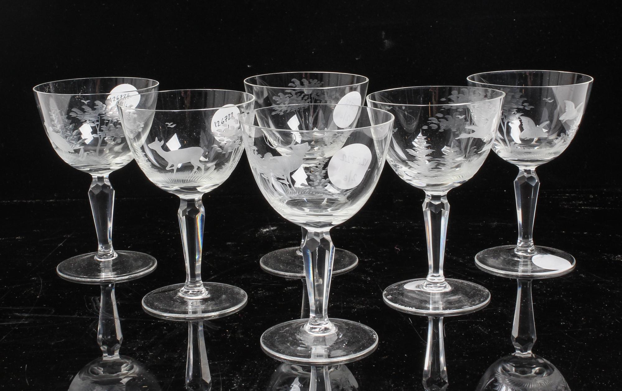 A Set of Six Etched Glass Stems Height 5 inches.