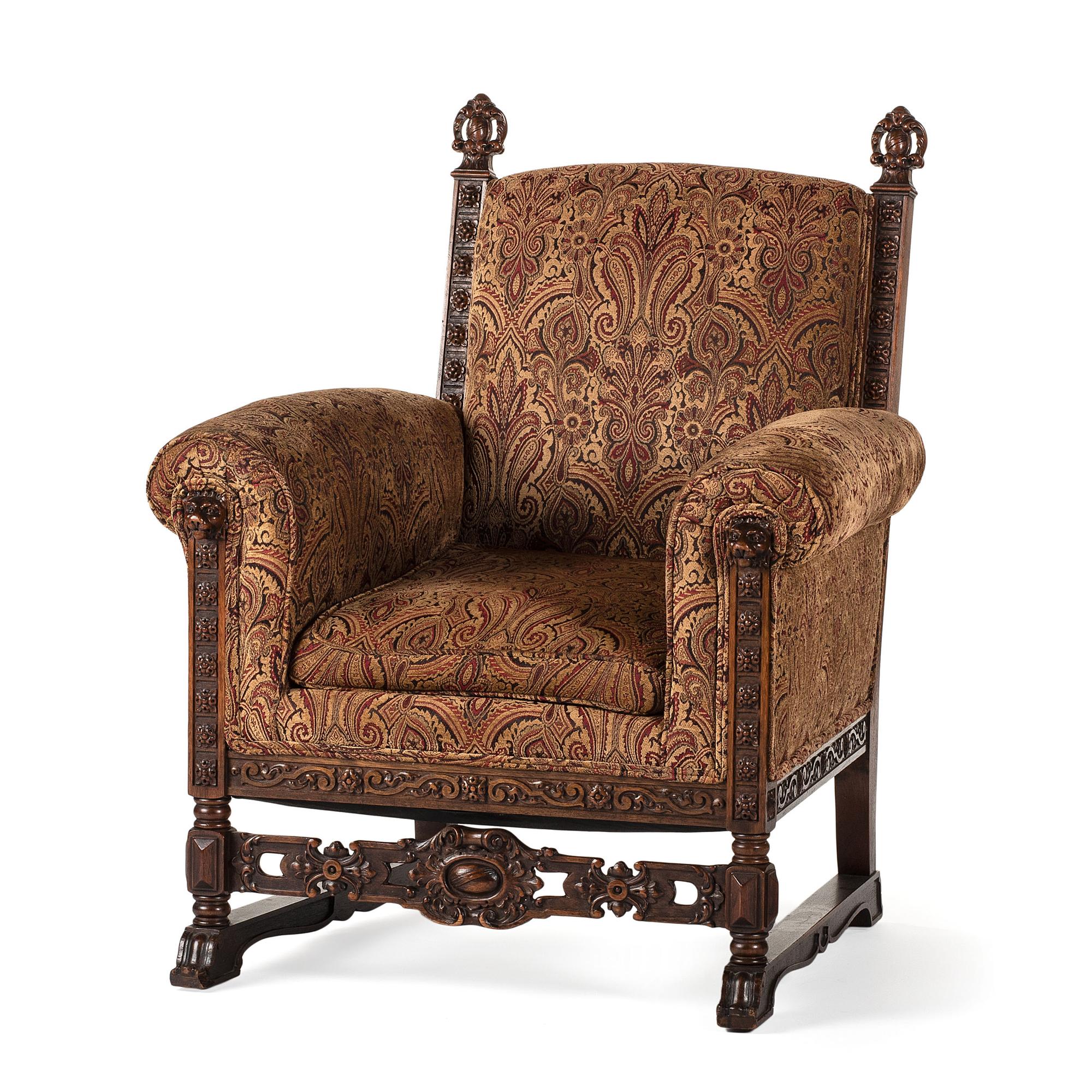 A Jacobean Style Carved Oak Sofa and Armchair