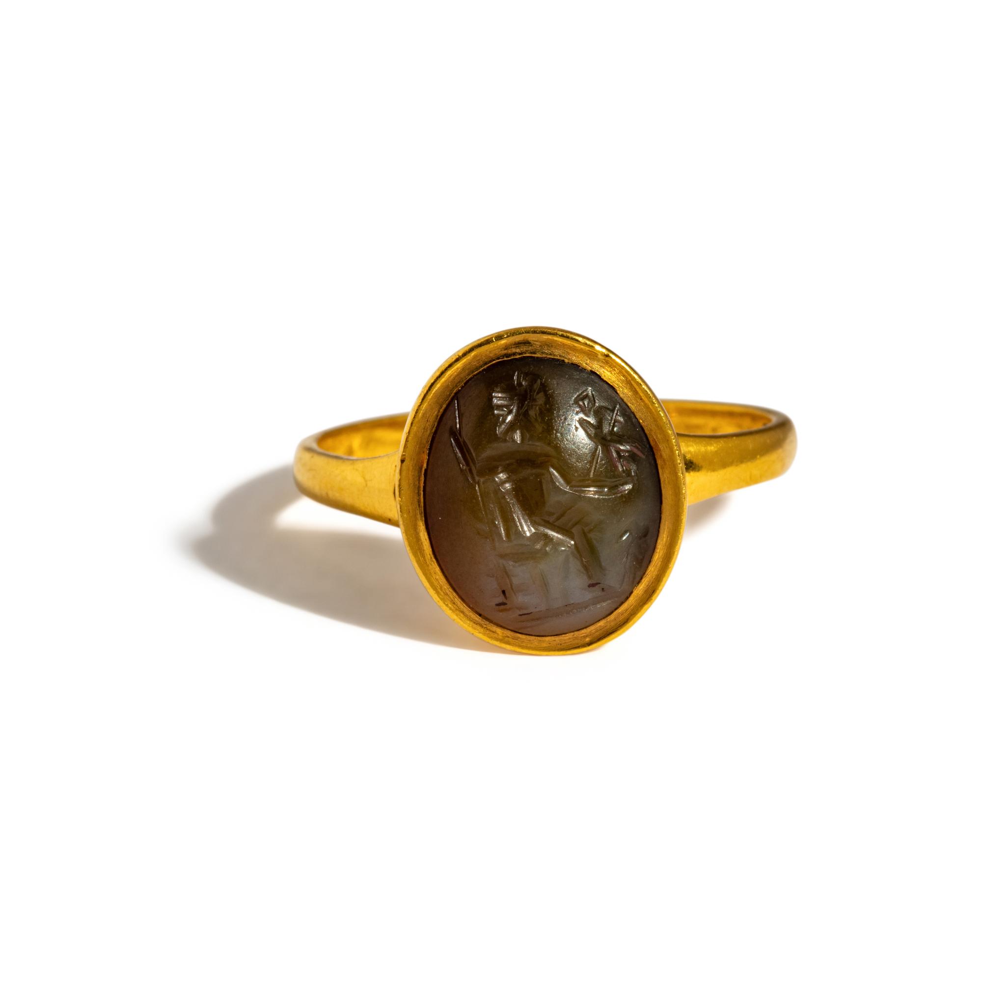 A Roman Chalcedony Ring Stone with the Gods Jupiter and Nike Enthroned — Set in a gold ring