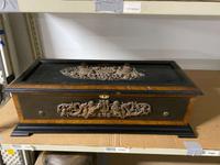 A Swiss Ebonized and Rosewood-Veneered Cylindrical Music Box