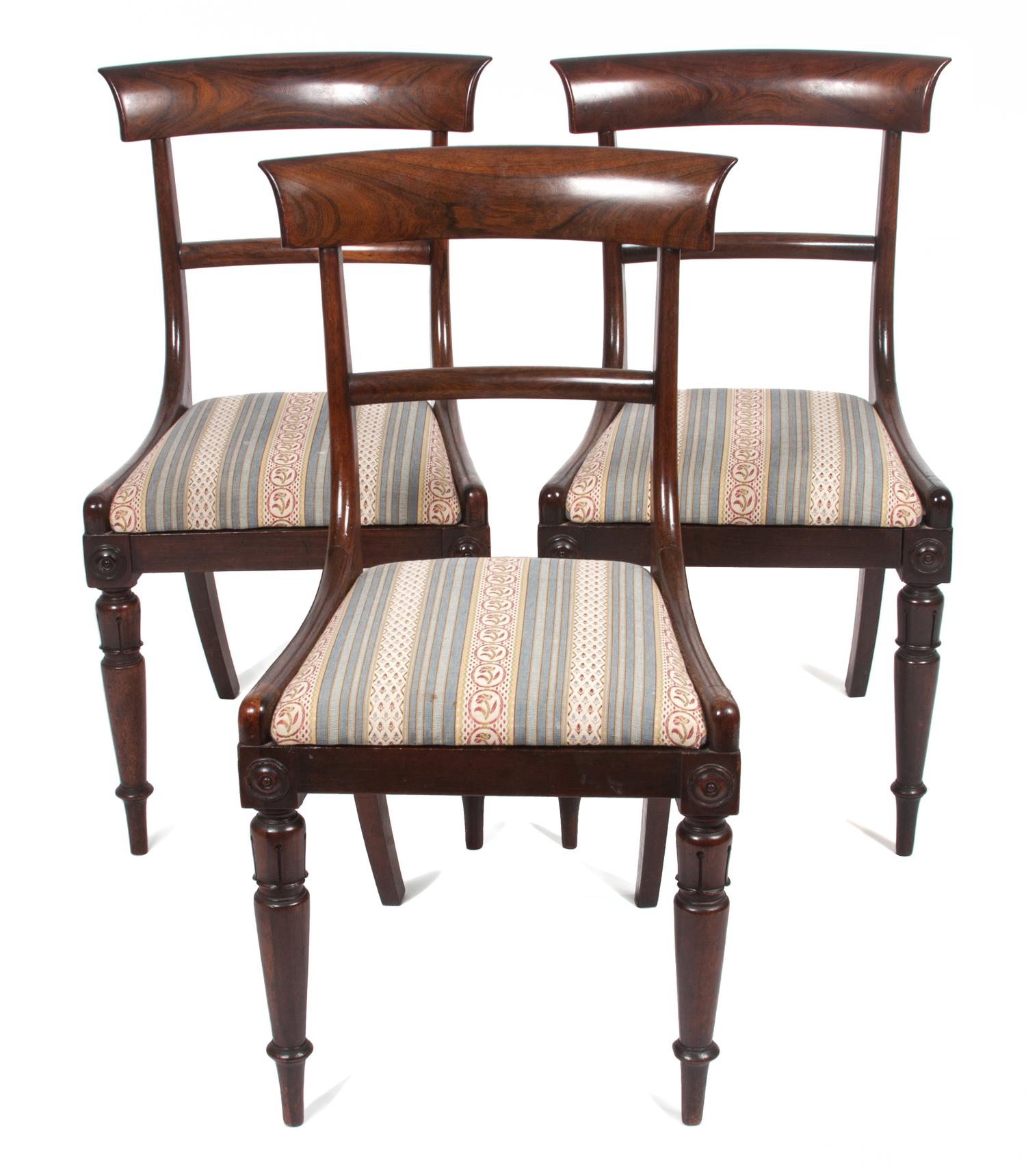 A Set of Eight Regency Rosewood Dining Chairs Height 33 inches.