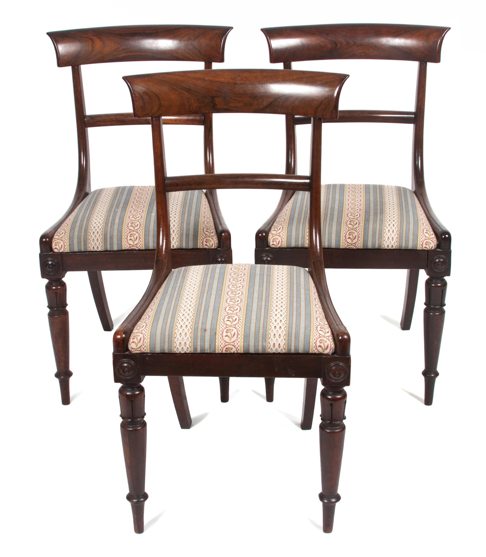 A Set of Eight Regency Rosewood Dining Chairs Height 33 inches.