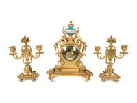 A French Gilt Bronze and Sèvres Porcelain Clock Garniture