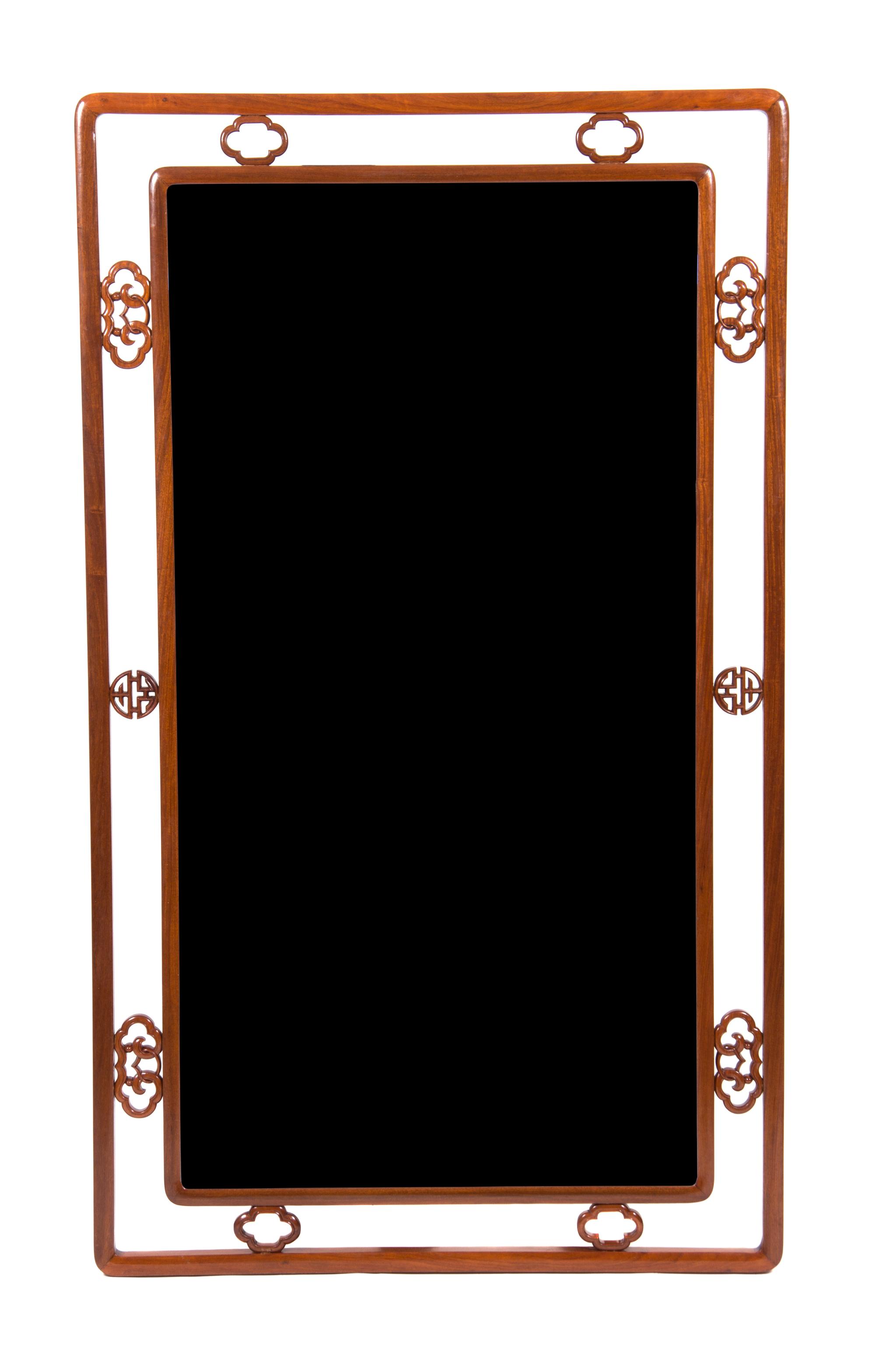 A Chinese Elmwood Framed Mirror 66 x 38 3/4 inches.
