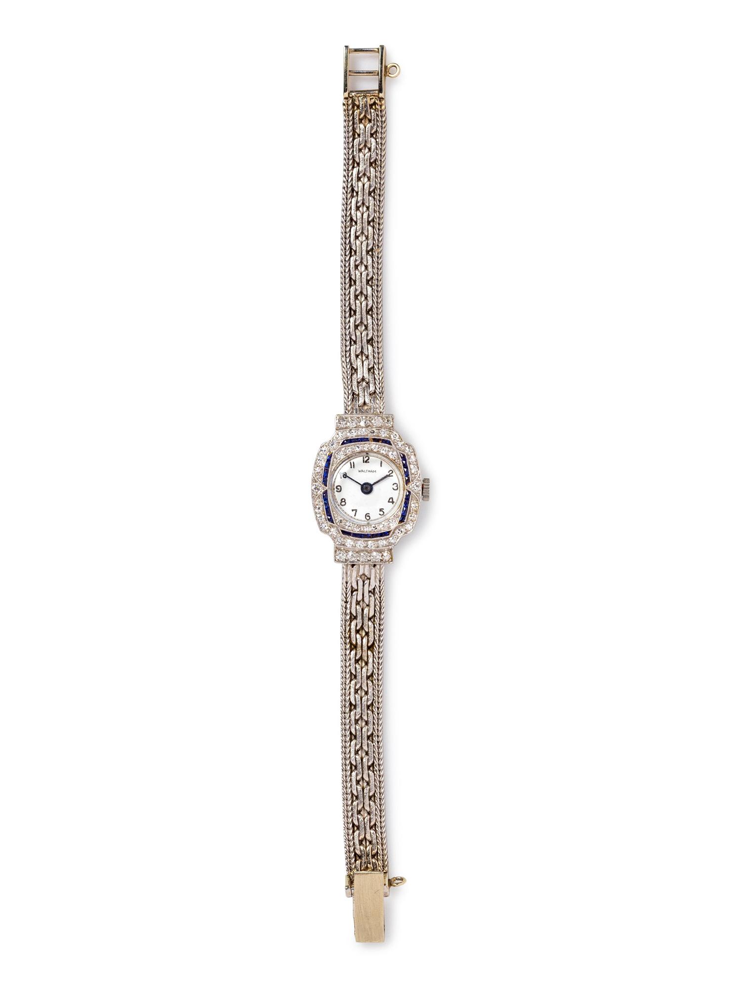 A 14 Karat White Gold, Platinum, Diamond and Sapphire Wristwatch, Waltham,