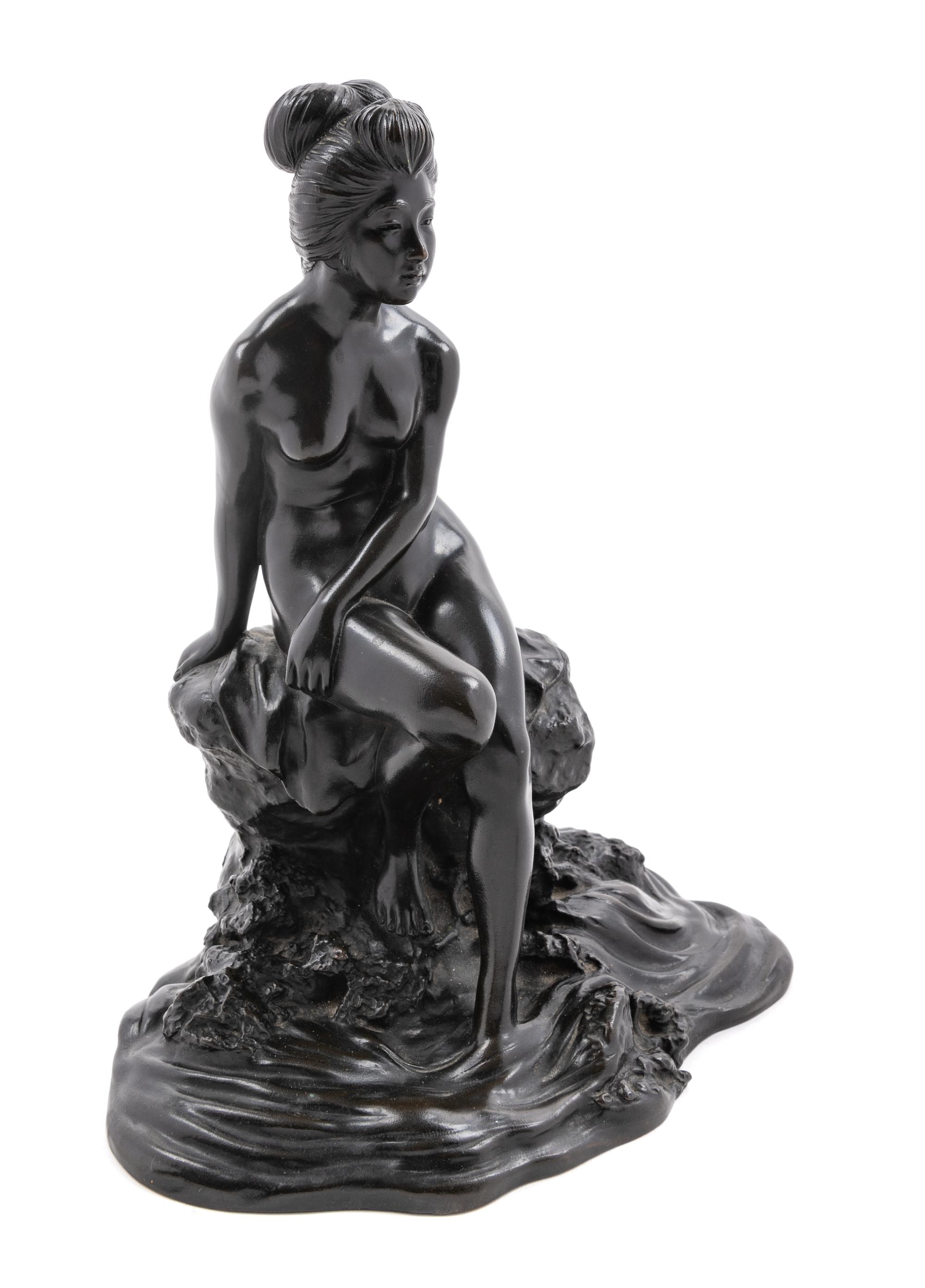A Japanese Bronze Figure of a Lady