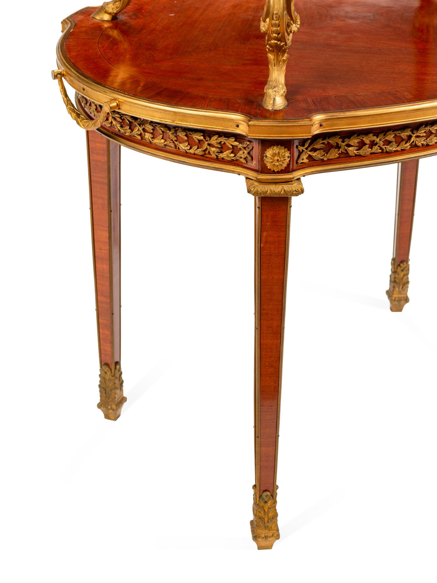 A Louis XVI Style Gilt Bronze Mounted Two-Tier Serving Table