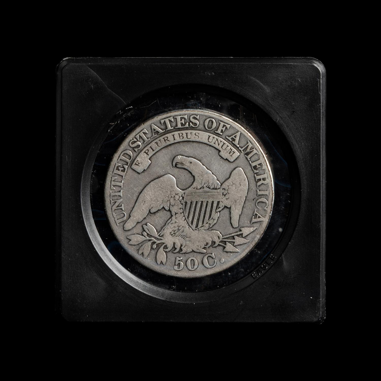 A Collection of Fourteen Capped Bust and Seated Liberty 50c Coins