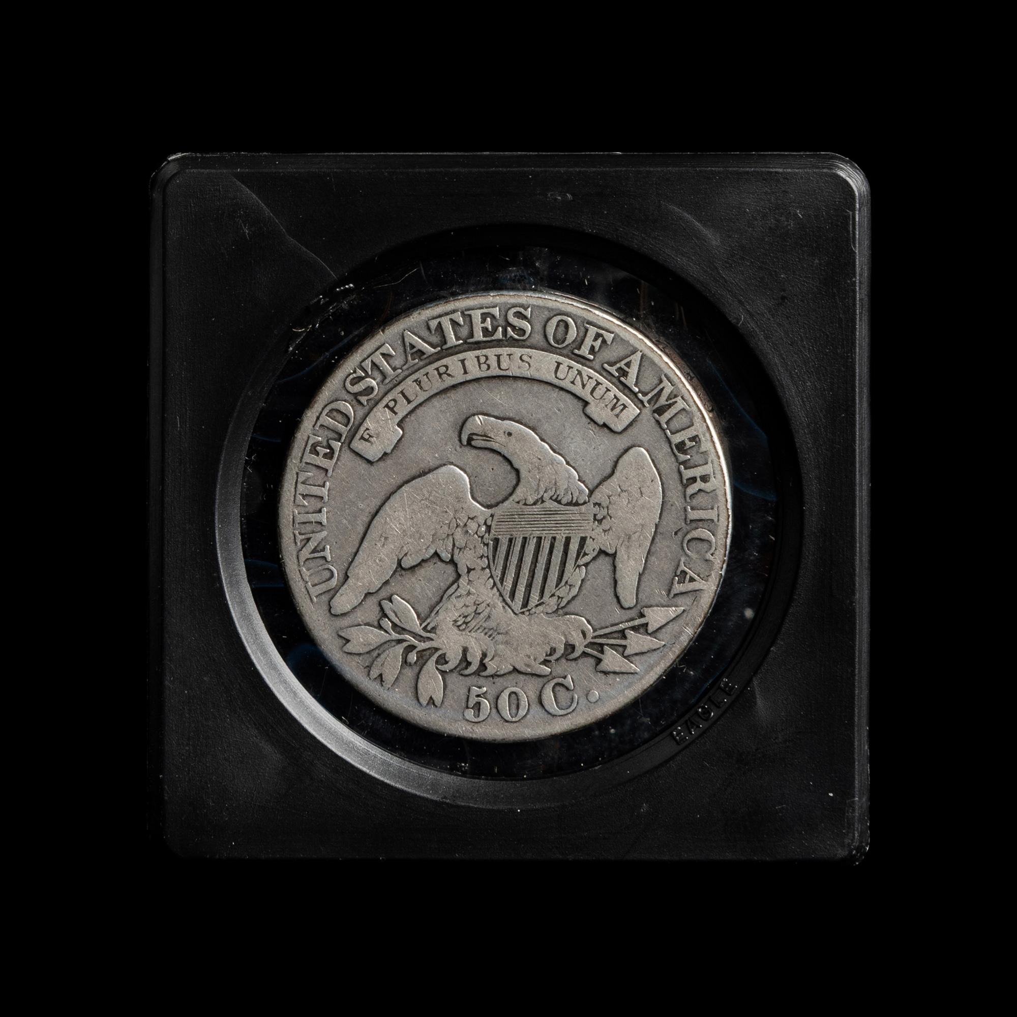 A Collection of Fourteen Capped Bust and Seated Liberty 50c Coins