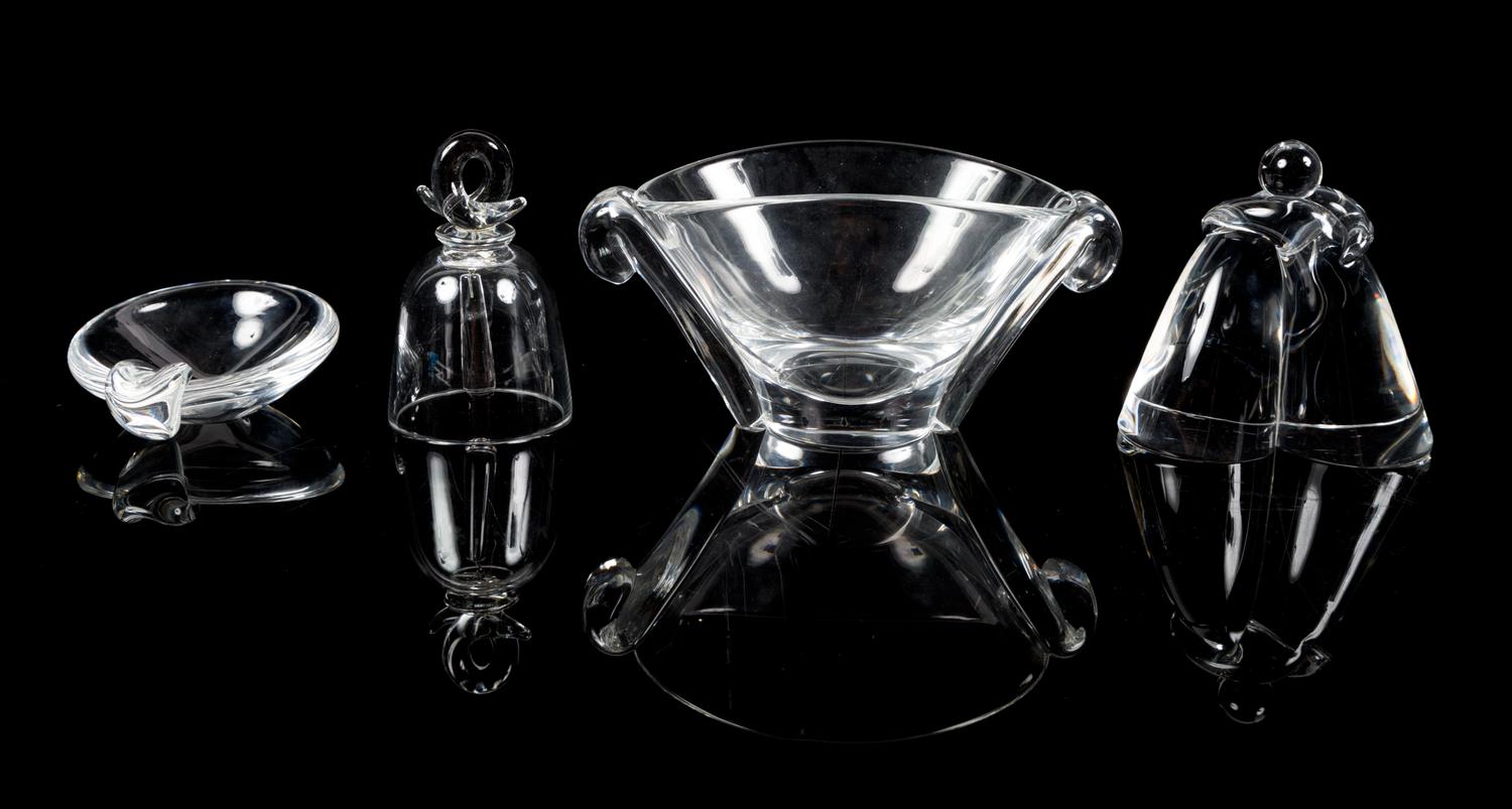 Steuben, a group of four table articles, comprising a bell, hugging figure, handled dish, and handled bowl