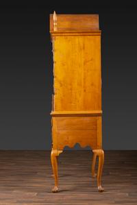 A Queen Anne Fan-Carved Tiger Maple Bonnet-Top Tablet-Foot High Chest