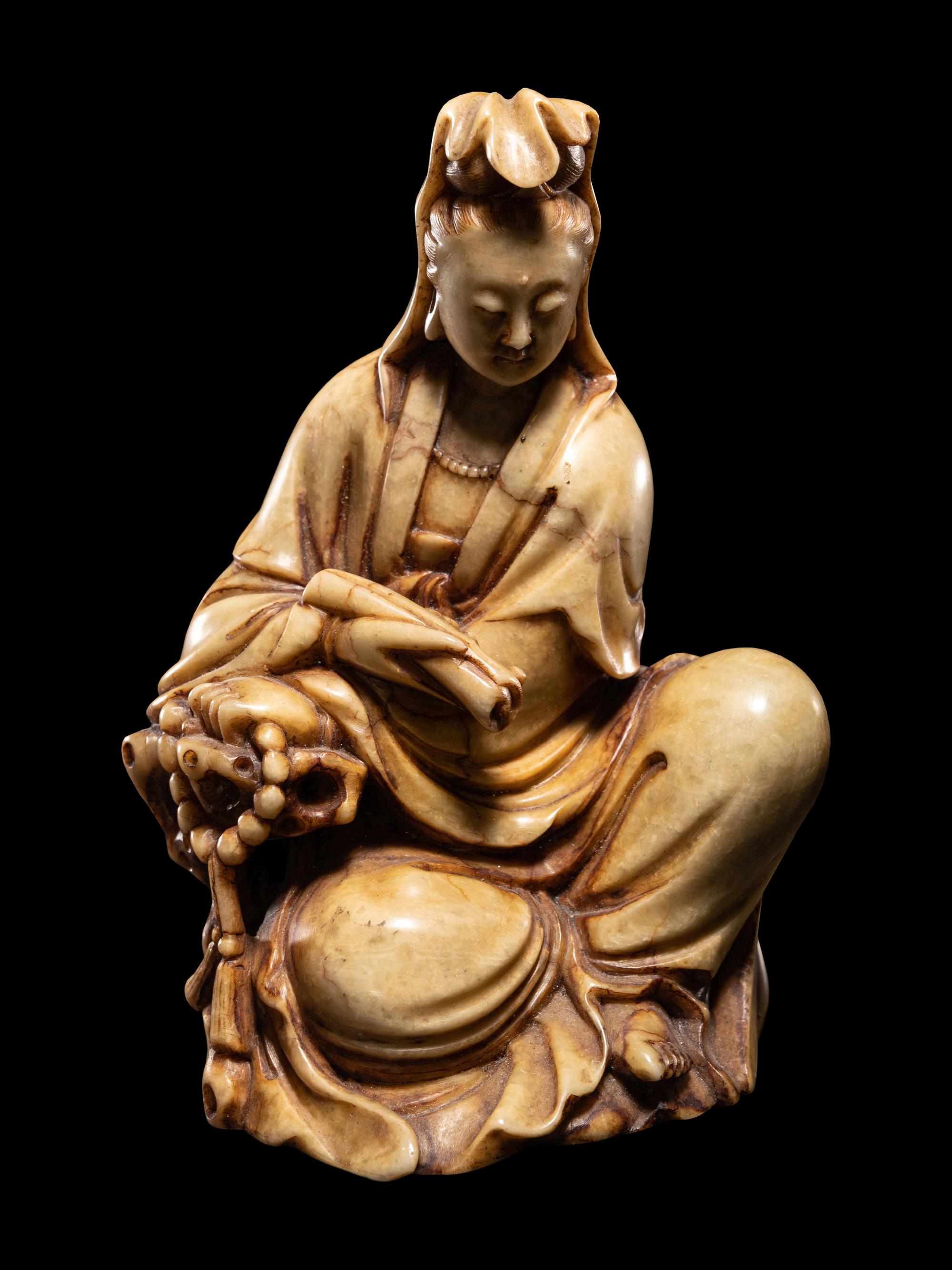 Four Chinese Carved Soapstone Figures of Immortals