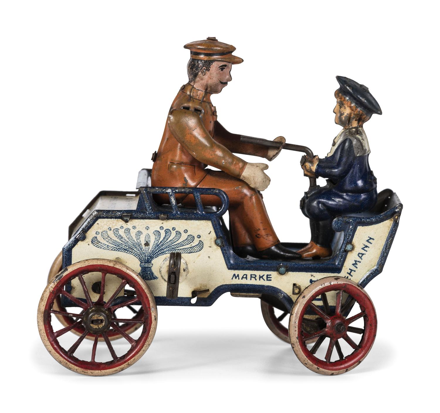 A Lehmann 'Naughty Boy' Tin Lithograph Windup Toy Car