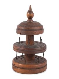 A Turned Cherry Spool Caddy