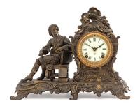 An Ansonia Cast Metal Figural Mantel Clock