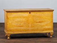 A Country Yellow and Red Paint Decorated Pine Blanket Chest