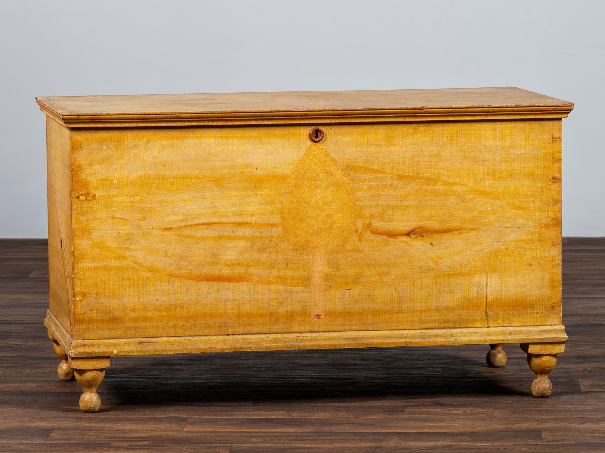 A Country Yellow and Red Paint Decorated Pine Blanket Chest