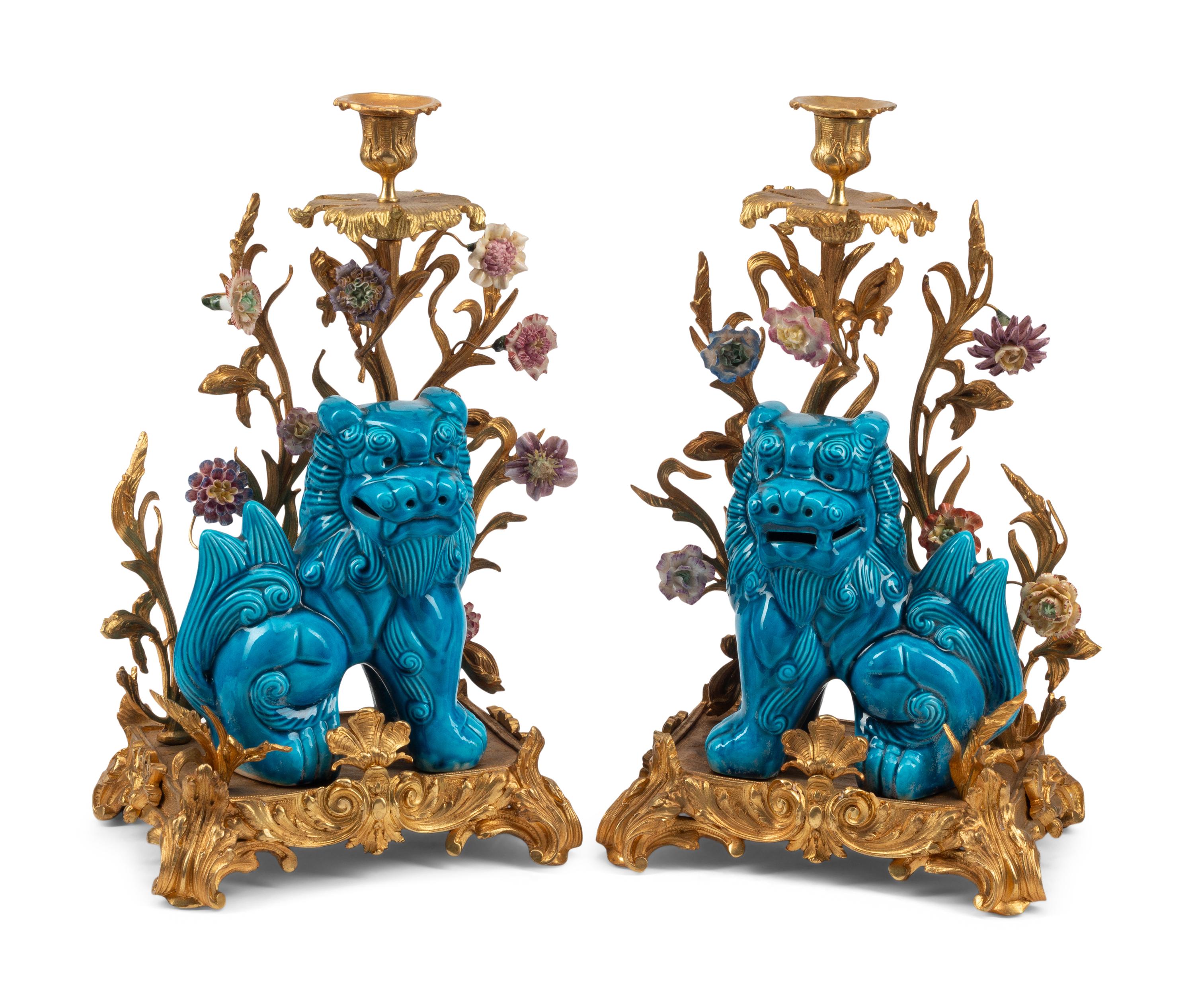 A Pair of French Gilt Bronze Mounted Turquoise Glazed Porcelain Guardian Lion Candelabra