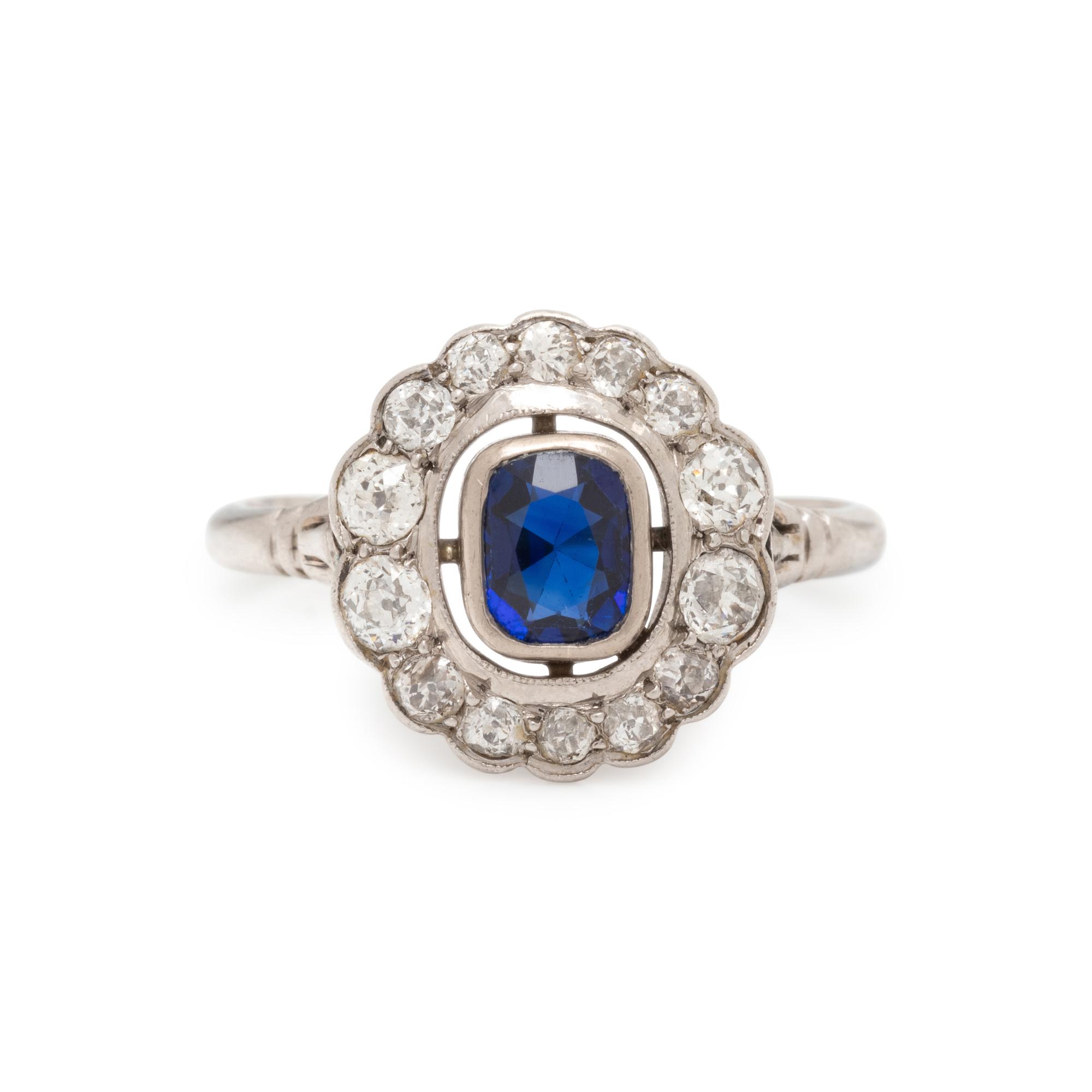 PLATINUM, SAPPHIRE AND DIAMOND RING