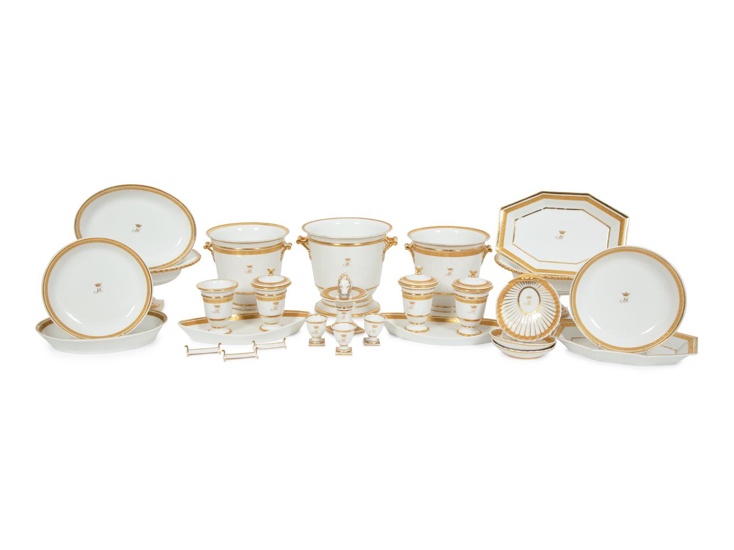 A Continental Gilt Decorated Porcelain Dessert Service