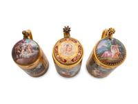 Three Vienna Painted and Parcel Gilt Porcelain Tankards
