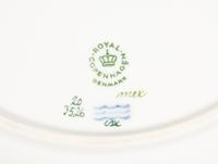 A Set of Twenty-Nine Royal Copenhagen Flora Danica Reticulated Porcelain Dinner Plates