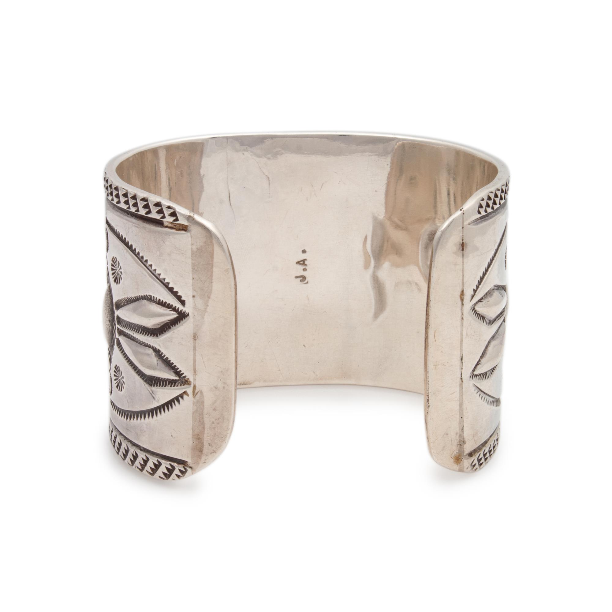 Heavily Stamped Cuff with Turquoise Cabochon Lot is located and will ship from Denver, Colorado