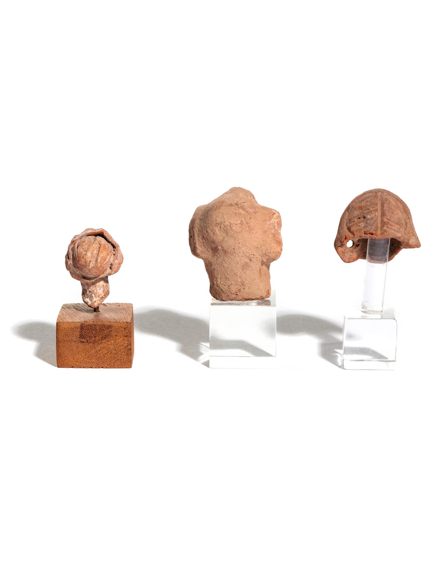 Three Graeco-Roman Terra Cotta Heads