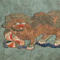 Two Chinese Blue Ground Silk Robes, Late Qing Dynasty 清晚期 藍地盤金繡游龍瑞獸纹道袍及藍地織錦女褂