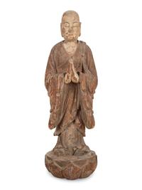 A Chinese Carved Wood Standing Figure with Polychrome Decoration