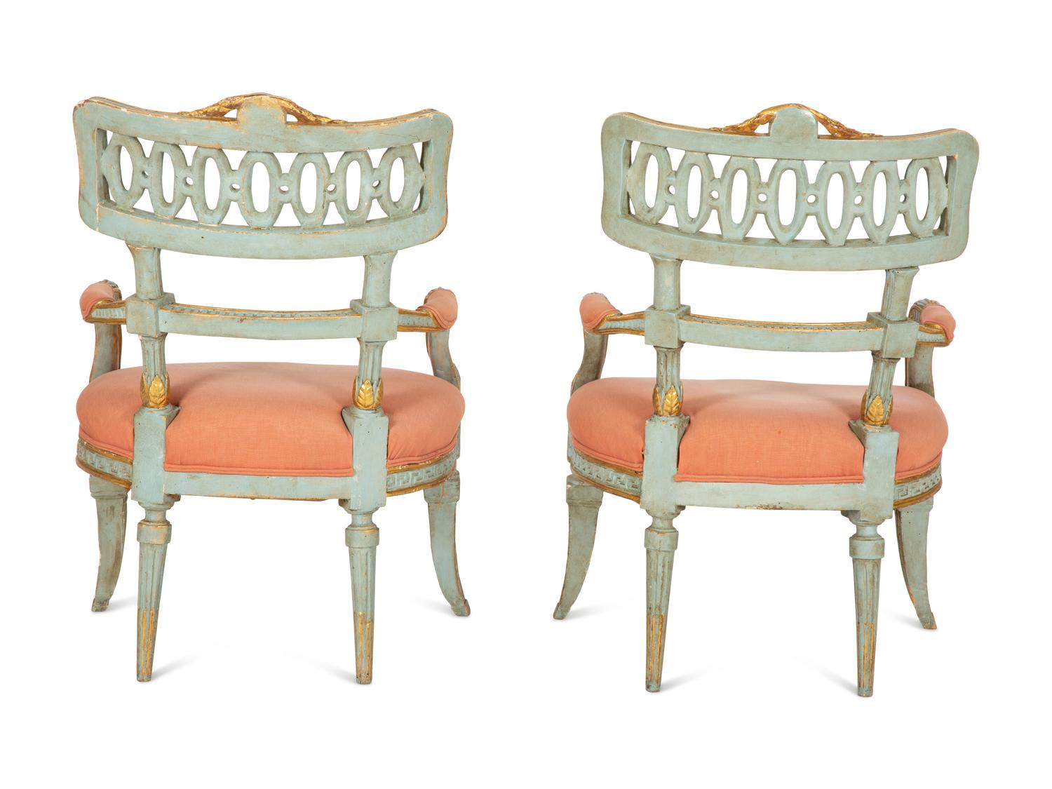 A Pair of Venetian Painted and Parcel Gilt Armchairs