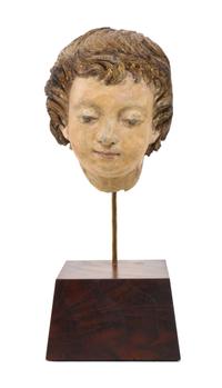 An Italian Carved Head of a Boy, POSSIBLY 15TH/16TH CENTURY WITH ALTERATION, Height of head 8 inches. — POSSIBLY 15TH/16TH CENTURY WITH ALTERATION,