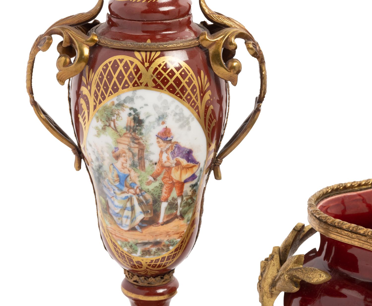 An Assembled French Gilt Metal Mounted Porcelain and Pottery Garniture