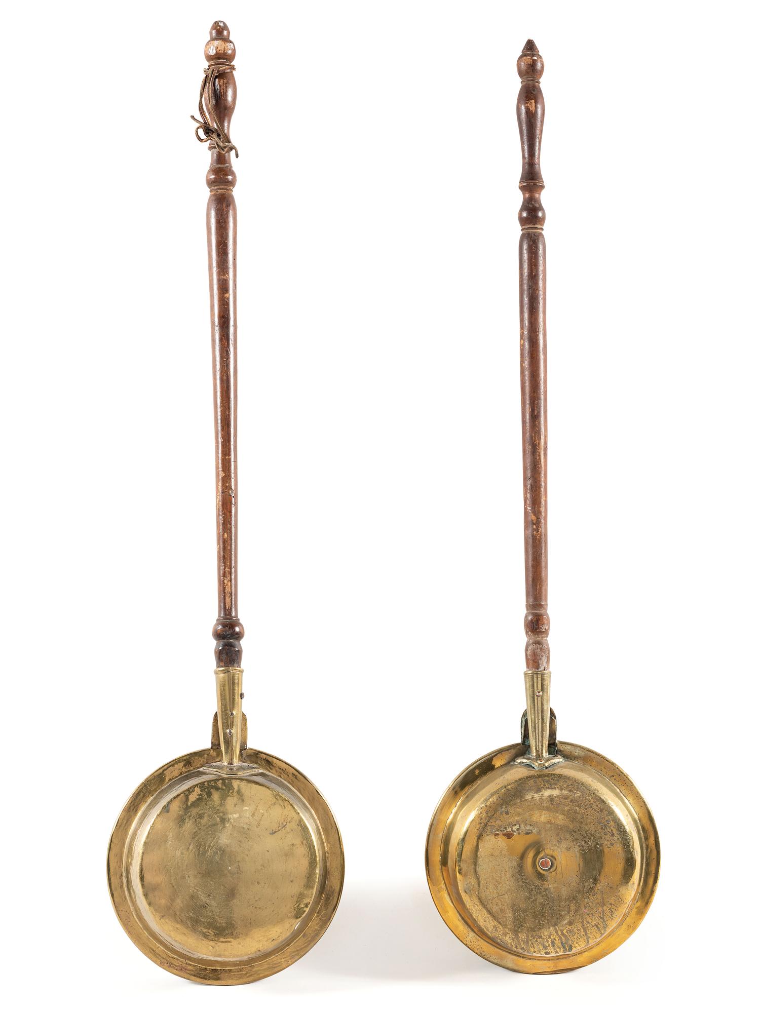 Two Engraved Brass and Wood Bed Warmers
