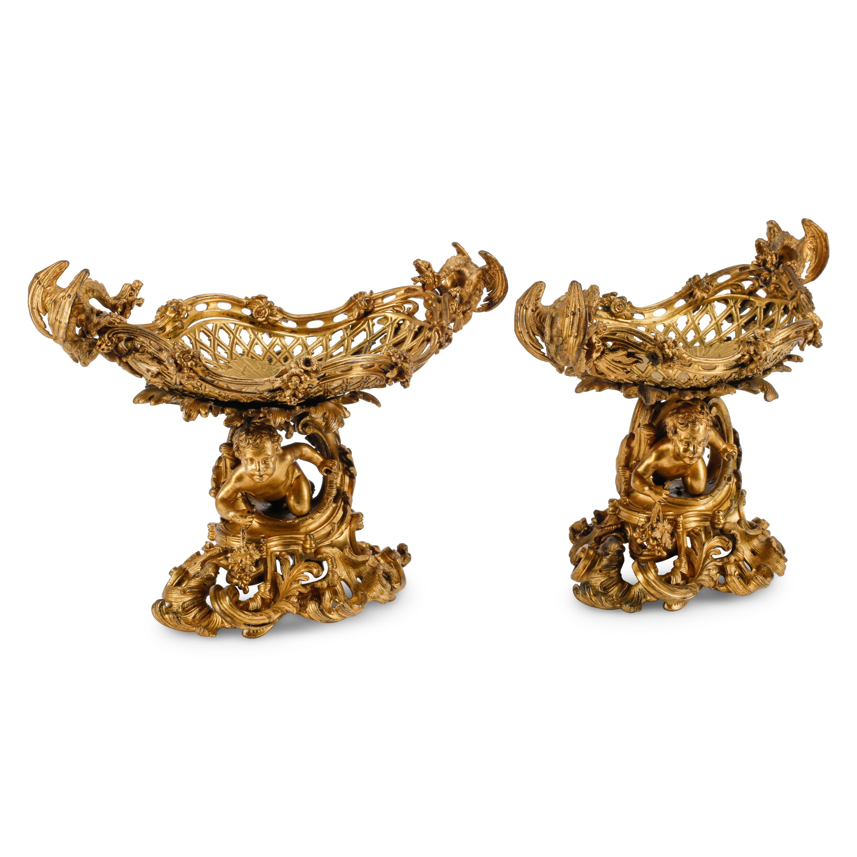 A Pair of French Gilt Bronze Figural Centerpieces