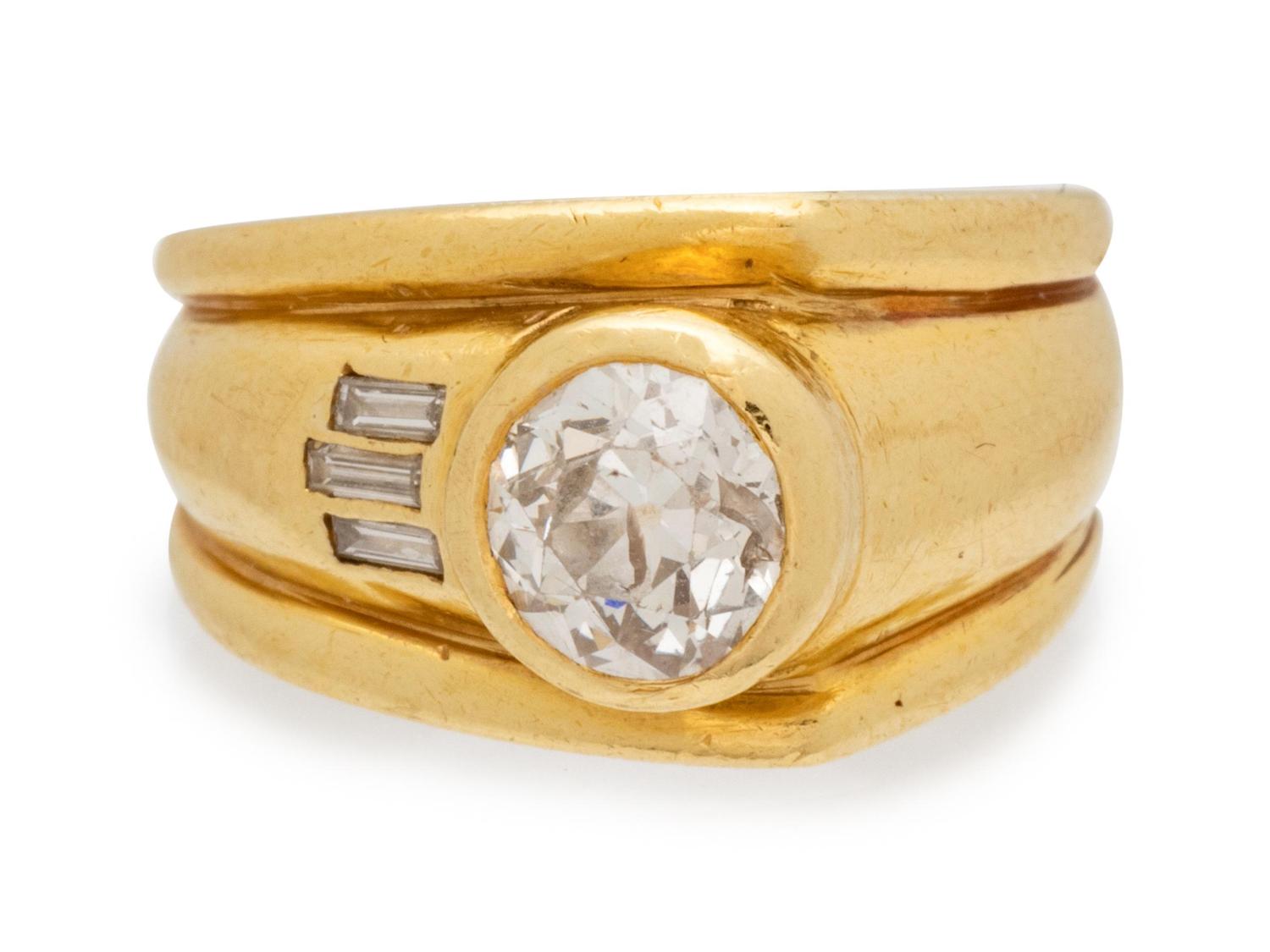 An 18 Karat Yellow Gold and Diamond Ring,