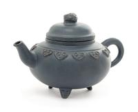 A Yixing Pottery Teapot Height 3 1/4 inches.