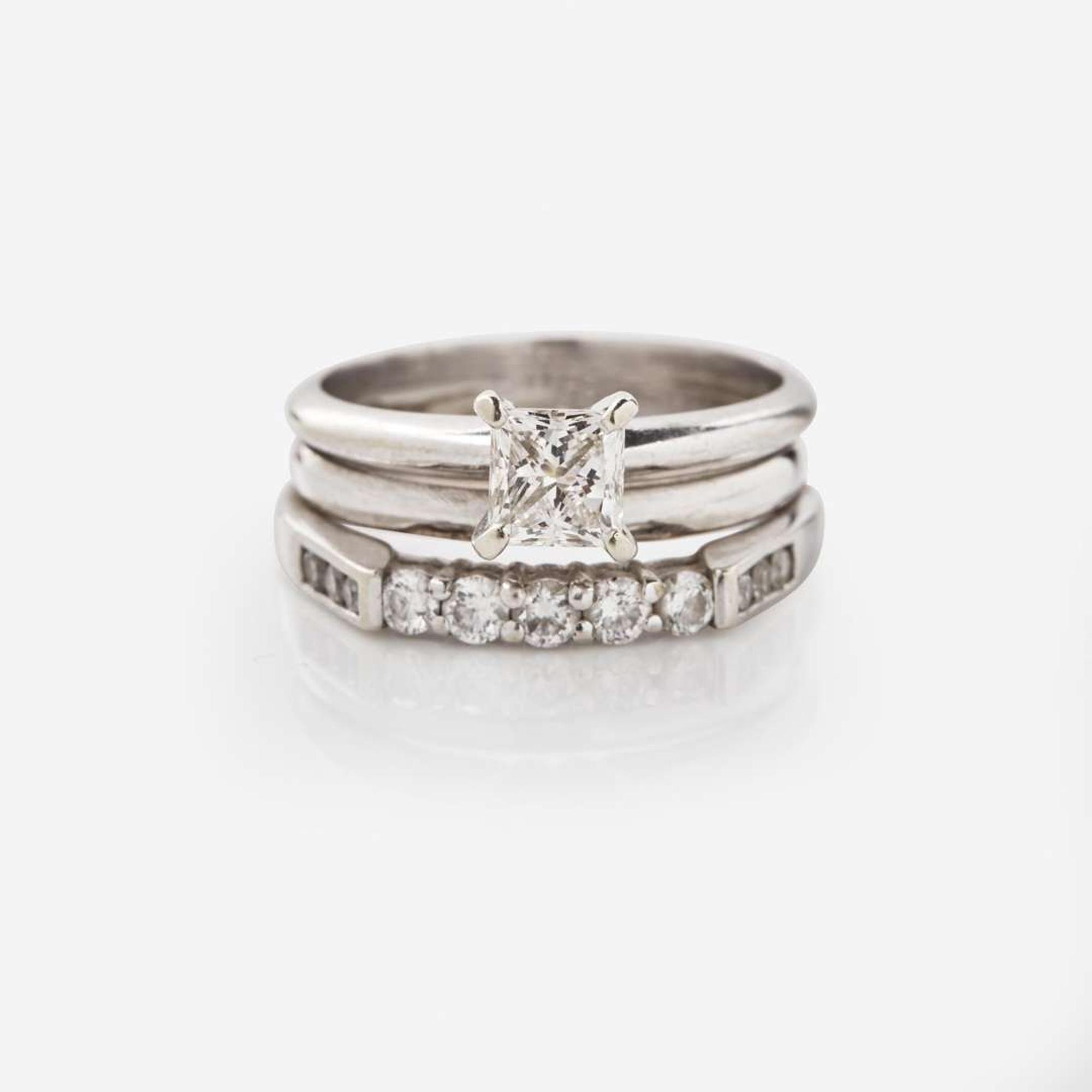 A 14K White Gold and Diamond Ring