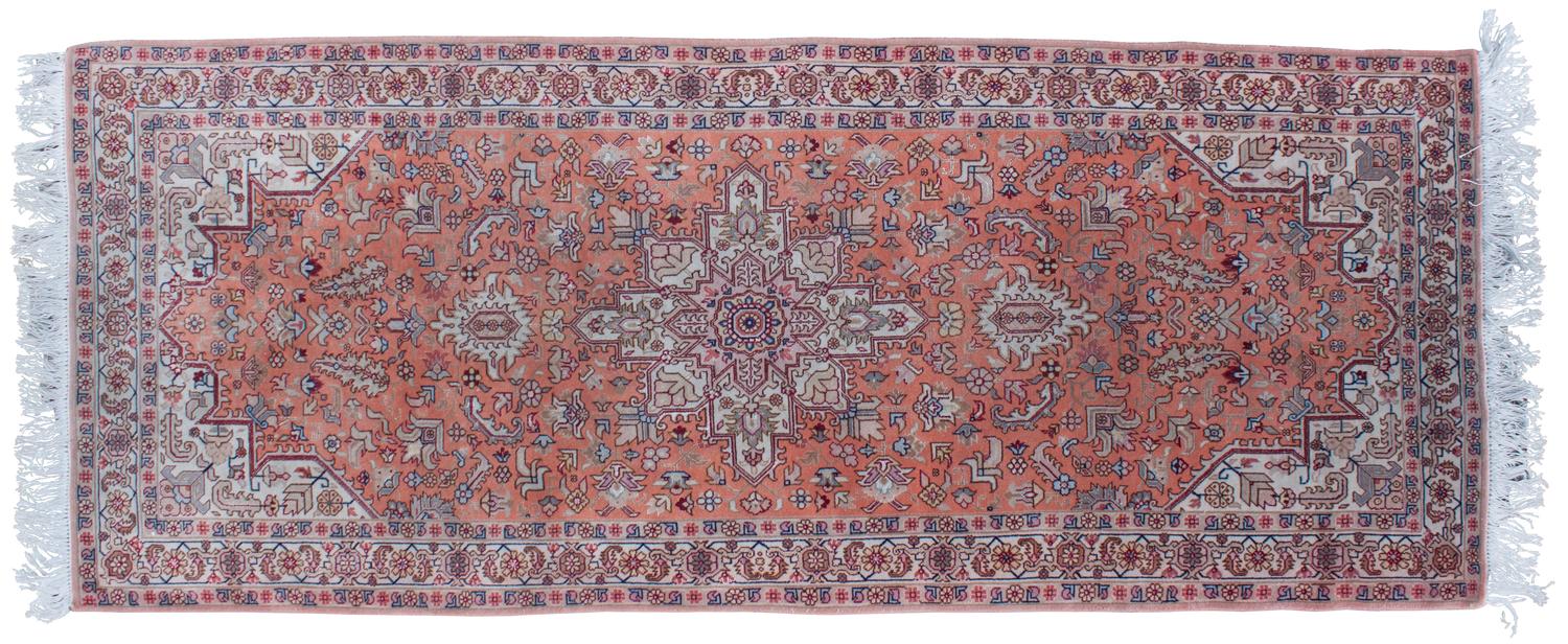 A Silk and Wool Rug 6 feet 5 inches x 2 feet 7 inches.