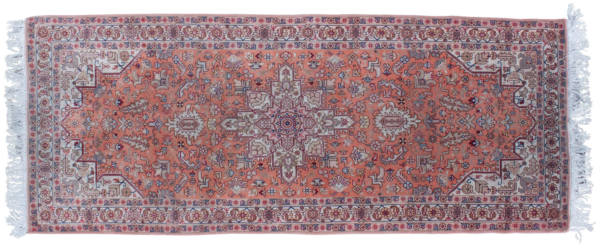 A Silk and Wool Rug 6 feet 5 inches x 2 feet 7 inches.