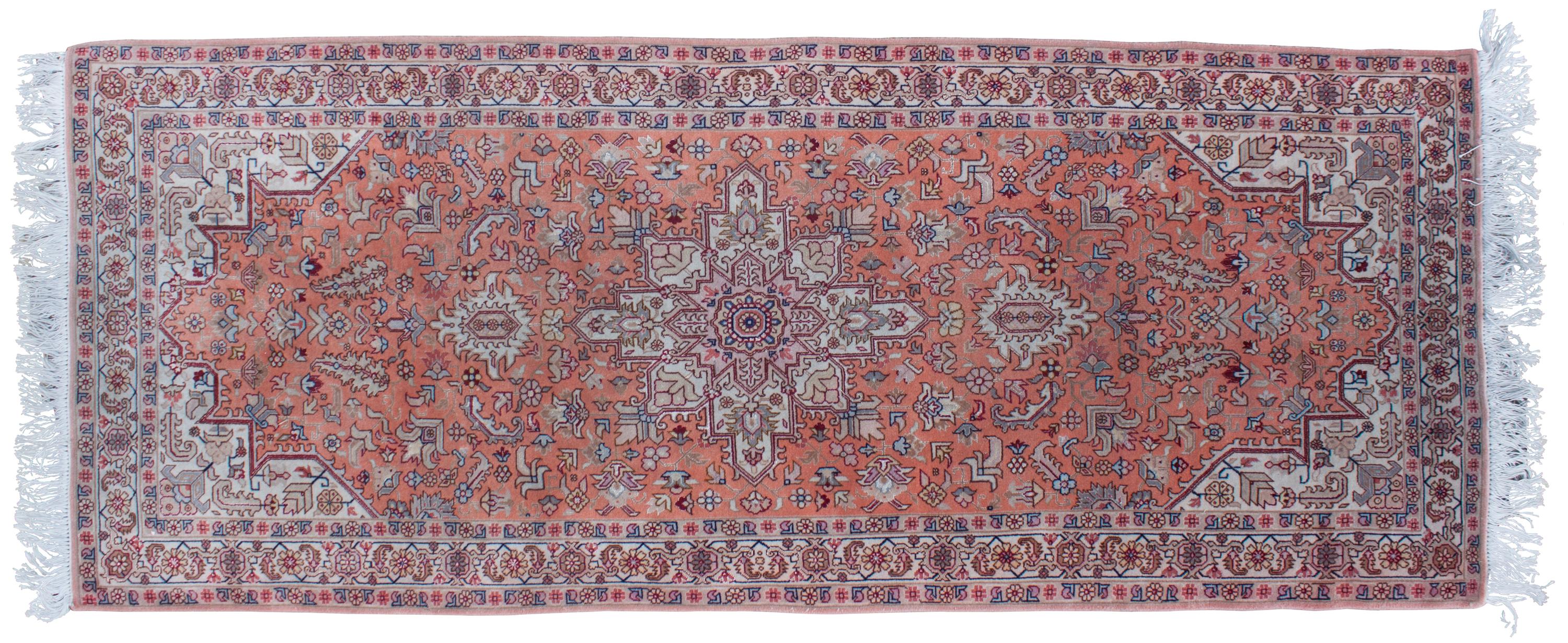 A Silk and Wool Rug 6 feet 5 inches x 2 feet 7 inches.