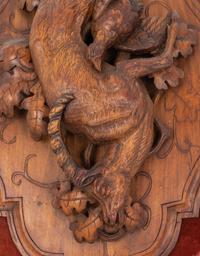 A Black Forest Carved Game Plaque