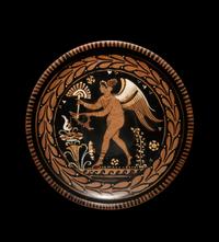An Apulian Red-Figured Plate with Striding Eros