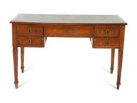 A Louis Phillippe Fruitwood Writing Table with Inset Green Leather Top