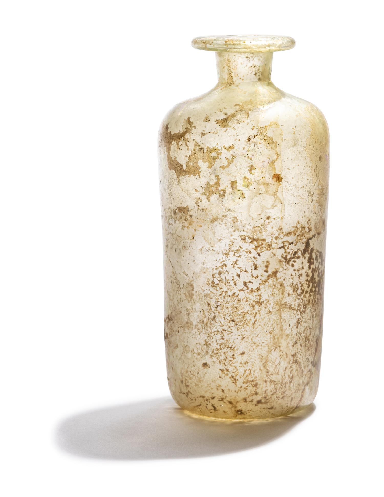 A Roman Pale Blue Glass Bottle