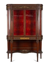 A Fine French Carved Mahogany Gilt Bronze Mounted and Glazed Curio Cabinet on Stand — CIRCA 1890