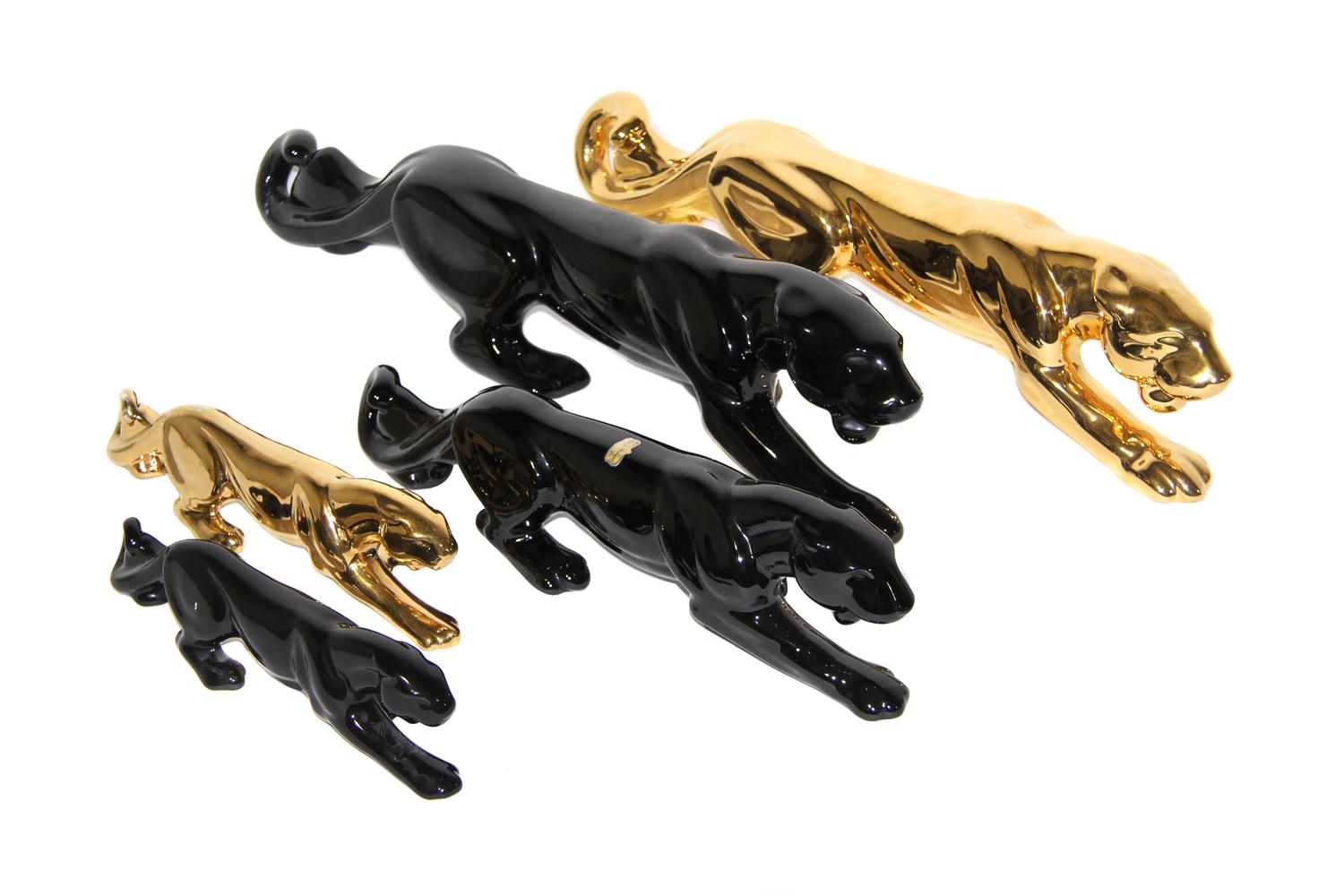 Five Haeger Pottery Panther Figures Length of longest 24 inches.